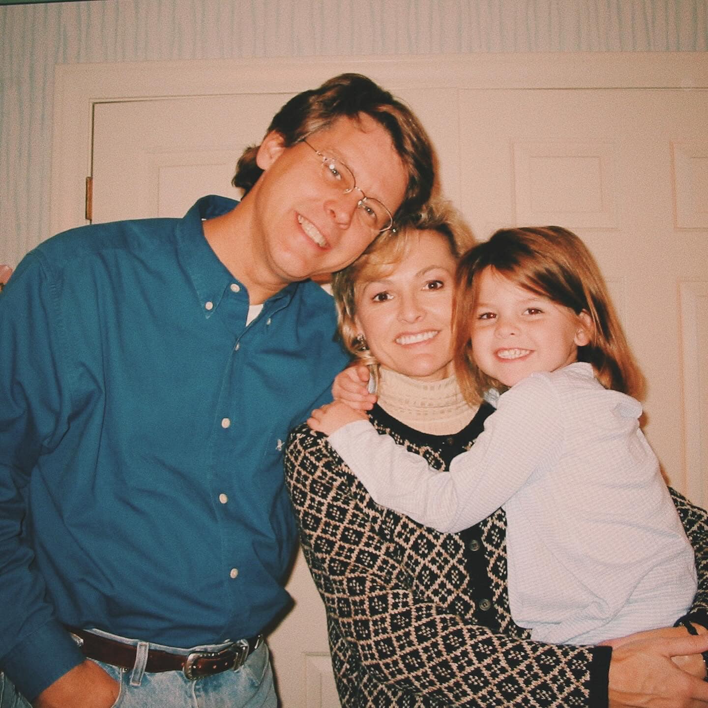 Abigail as a child with her parents