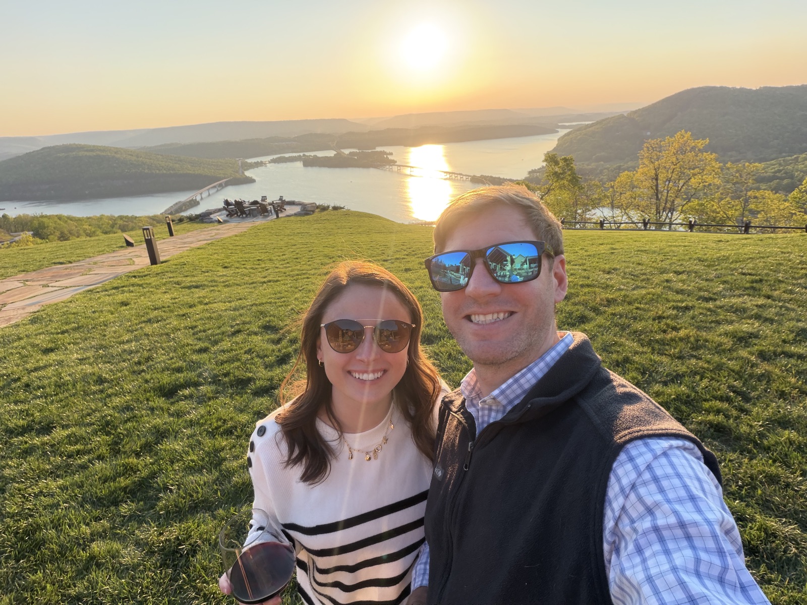 Beau and Betsy above the lake at sunset