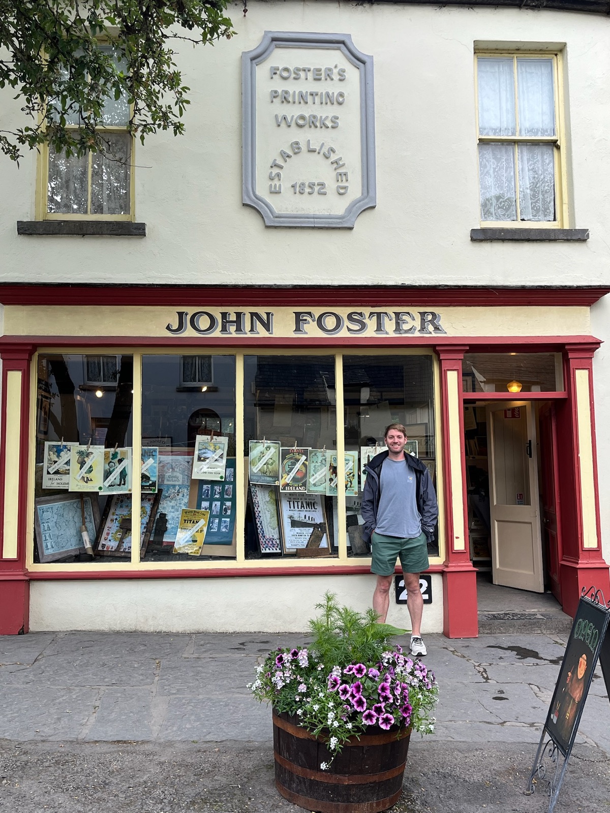 Beau outside a print shop in Ireland