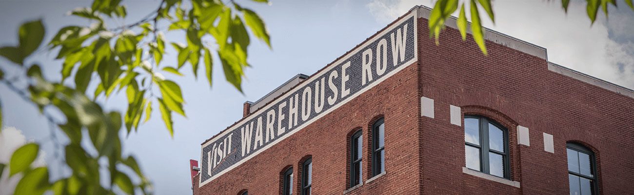 Brick Warehouse Row building with its rooftop sign