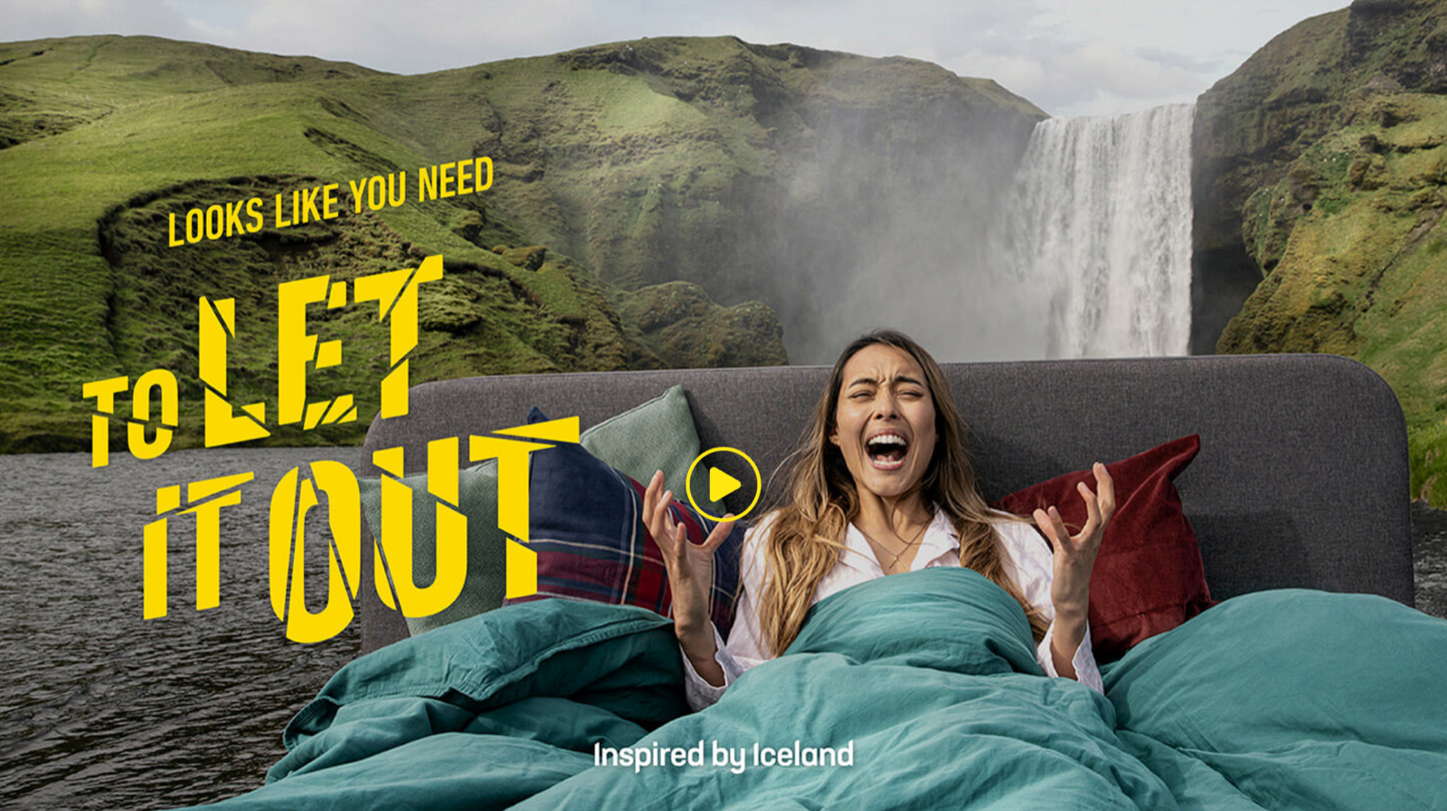 Iceland tourism ad still: a woman screaming in bed in front of a waterfall under the line Looks like you need to let it out
