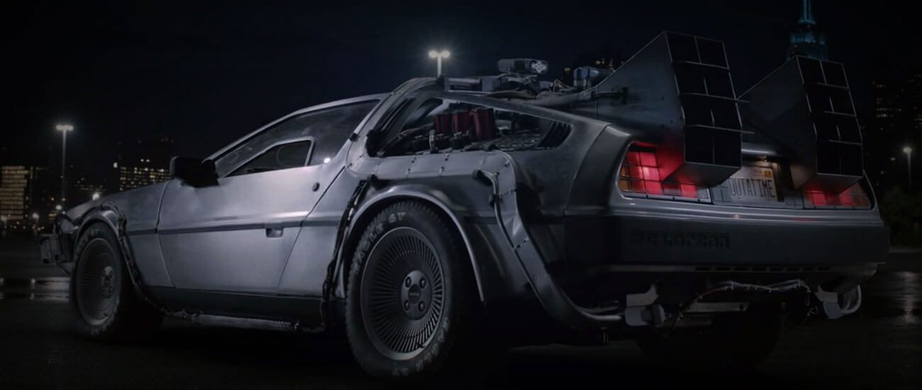 DeLorean time machine on a dark street