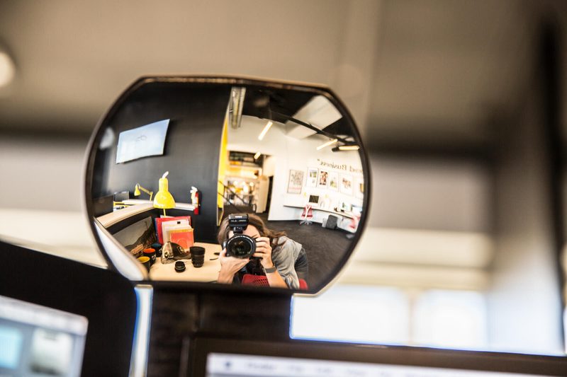 Office reflected in a convex mirror