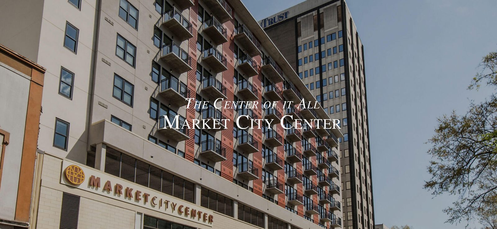 Market City Center building with its sign, The Center of it All