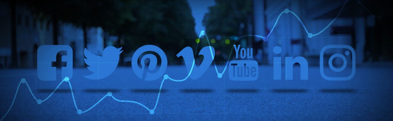 Social media icons over a blue analytics chart