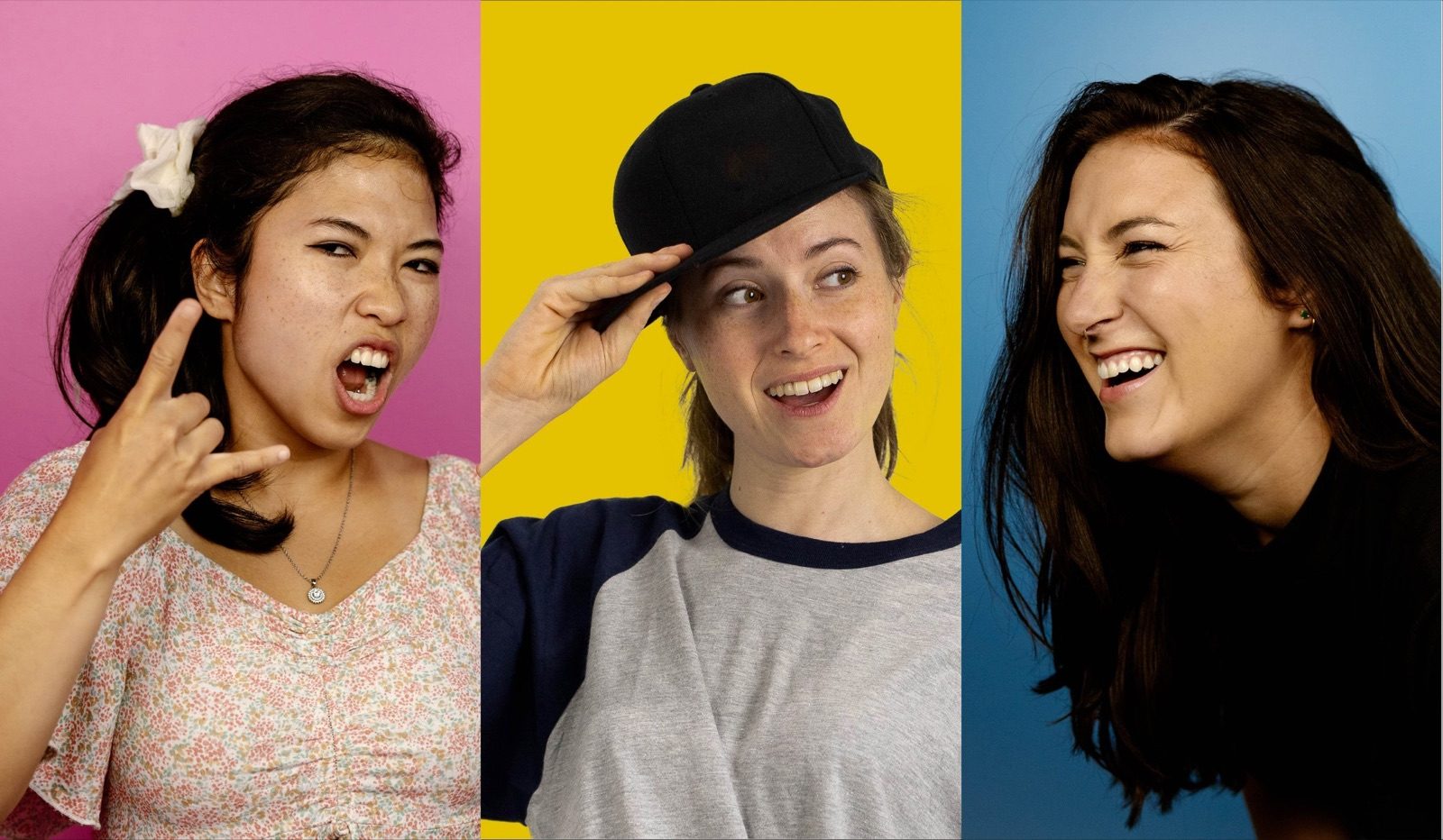Three women pulling playful faces against pink, yellow and blue panels