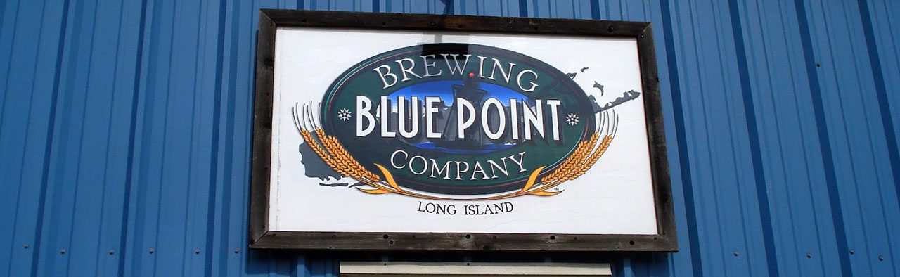 Blue Point Brewing Company sign on a blue building