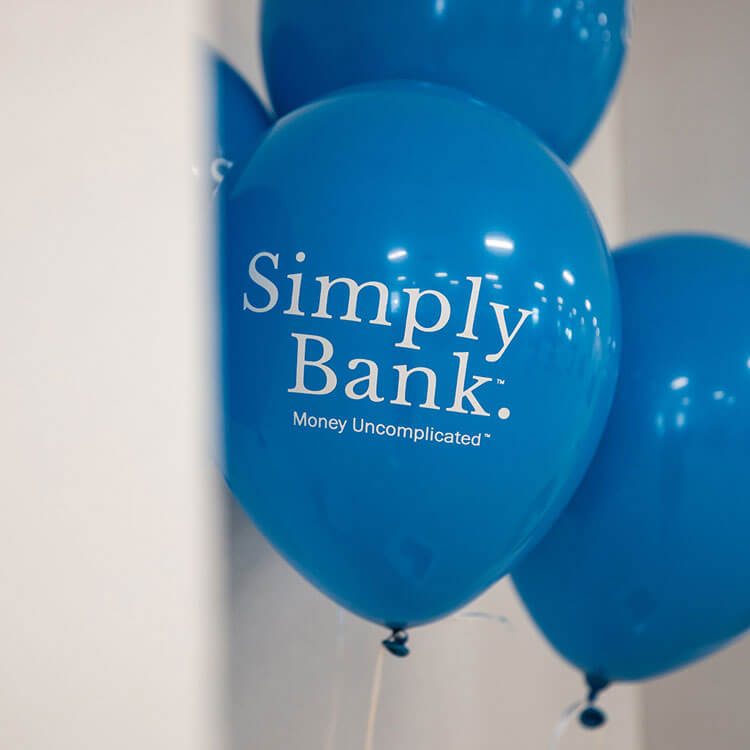 Blue Simply Bank balloons reading Money Uncomplicated