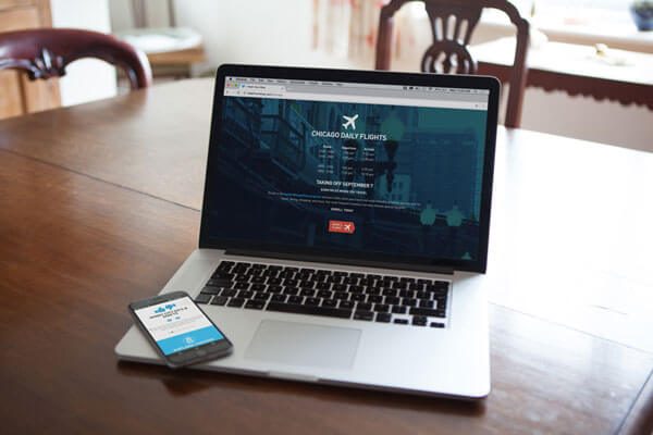 Laptop and phone showing the nonstop flights microsite