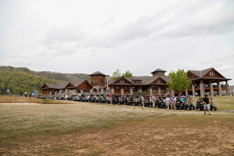 Golfers gathered outside the clubhouse before the tournament
