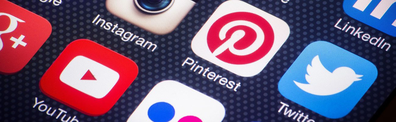 Social media app icons on a phone screen