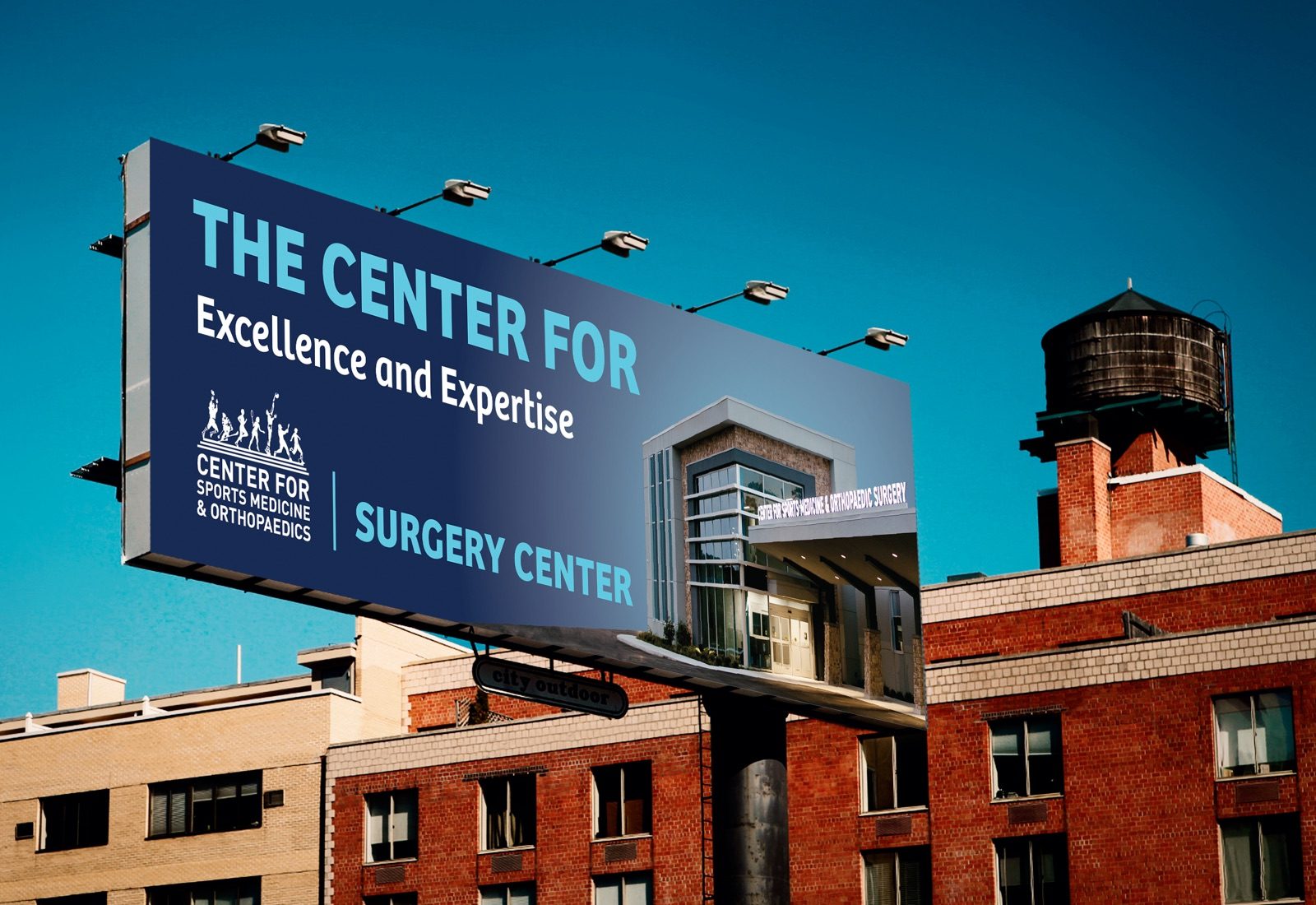 Billboard reading The Center For Excellence and Expertise, Surgery Center, for Center for Sports Medicine and Orthopaedics
