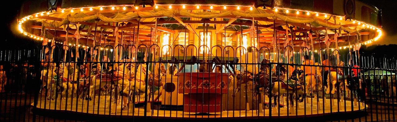 Lit carousel at night
