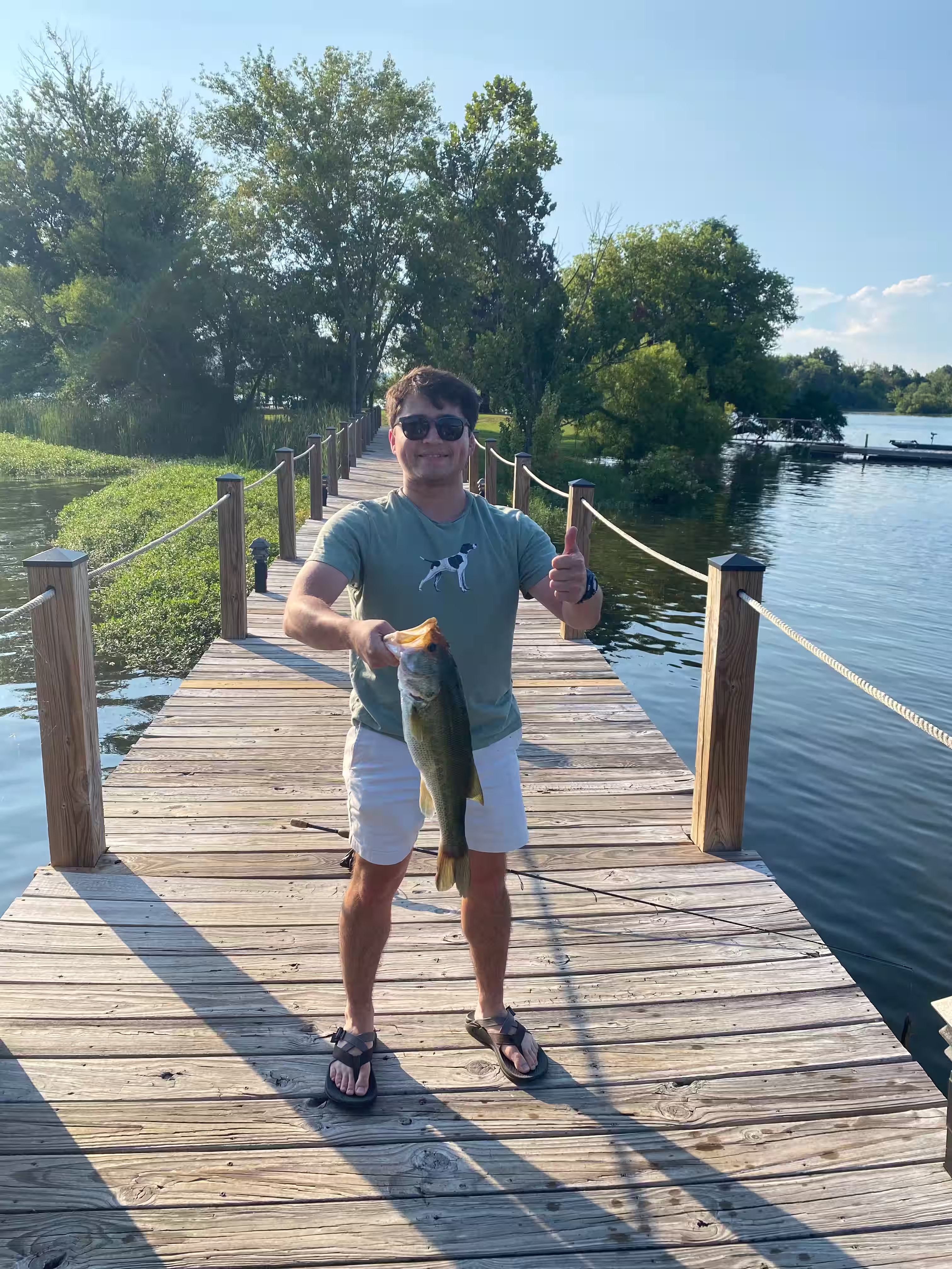 Bob on the dock with a largemouth bass