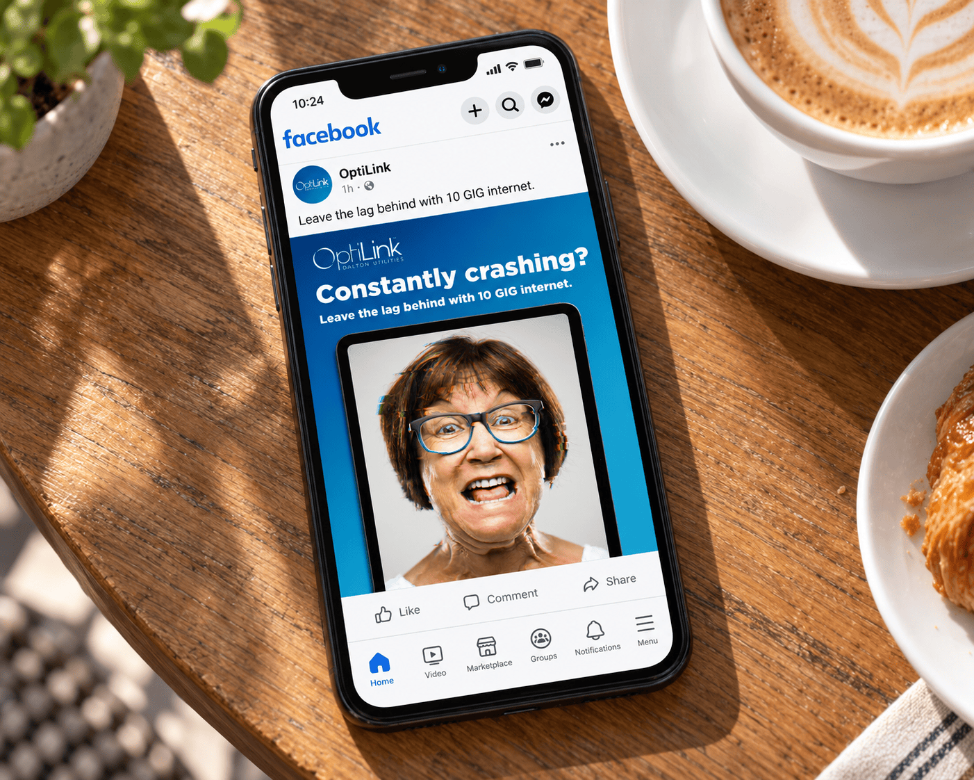 “Constantly crashing?” Facebook post on a phone