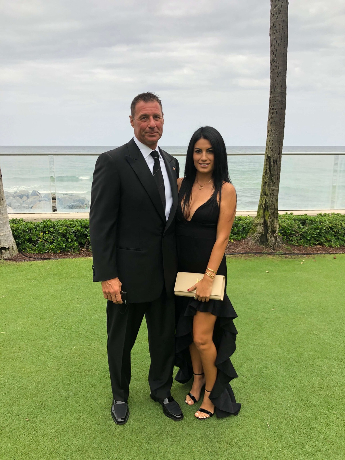 Eric and his wife dressed for a black-tie evening