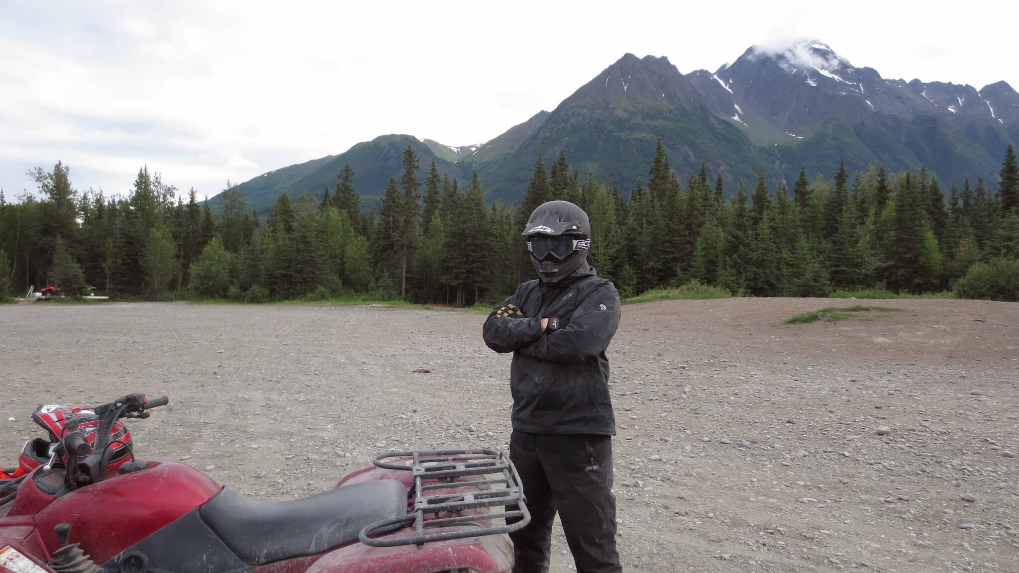 Grant on an ATV ride in the Alaska range
