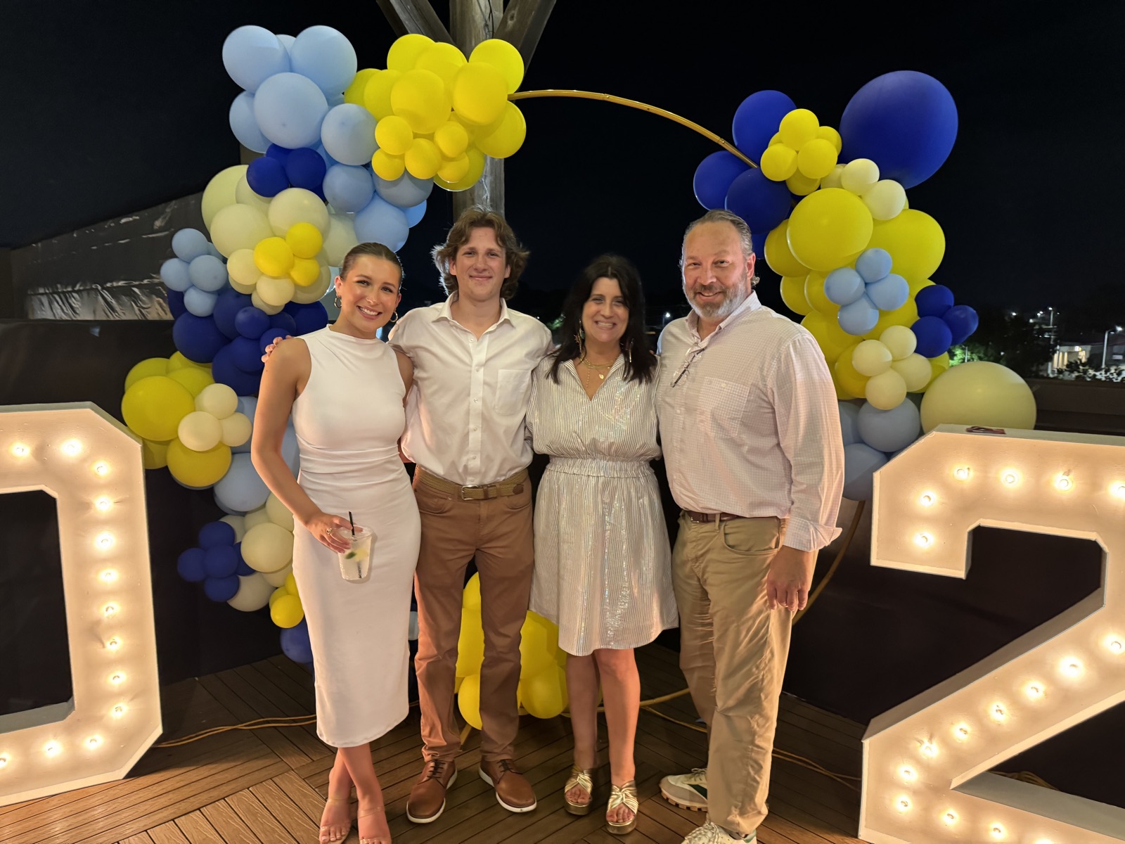 Lilee with her family at a celebration