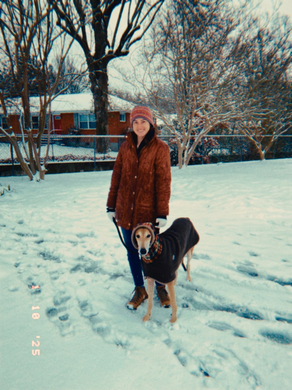 Morgen out in the snow with her dog