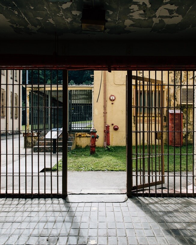 Looking out from behind the bars